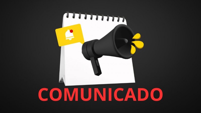 Um megafone sobre um calendário em branco, com a palavra comunicado em vermelho abaixo e fundo preto